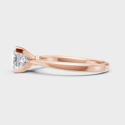 Blush rose gold engagement ring with hallmarked princess-cut lab diamonds