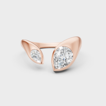 Romantic rose gold engagement ring with a  pear-cut lab-grown diamond