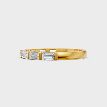 yellow gold baguette diamond eternity band for a timeless and ethical look