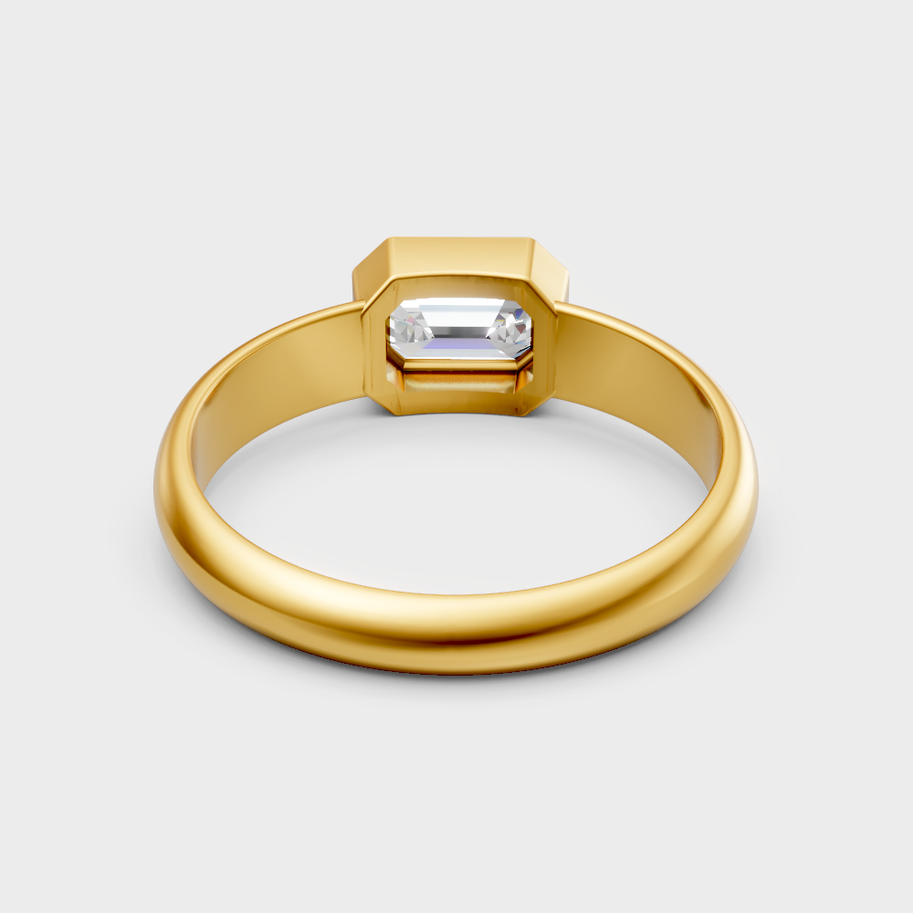 Gold ring with a diamond of Emerald cut