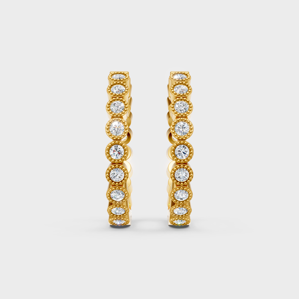 Classic yellow gold diamond hoops featuring 