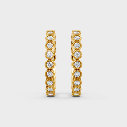 Classic yellow gold diamond hoops featuring 