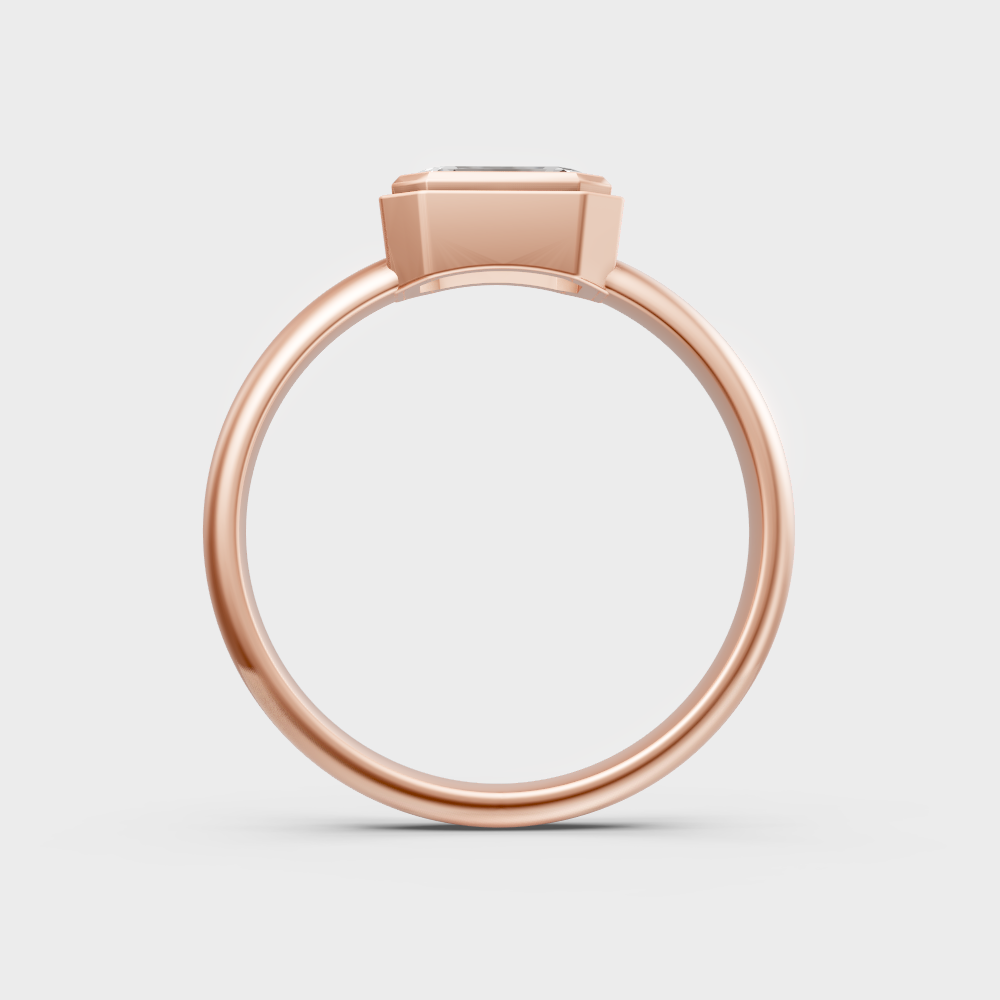 Modern 9K rose gold solitaire ring with a hallmarked emerald-cut diamond