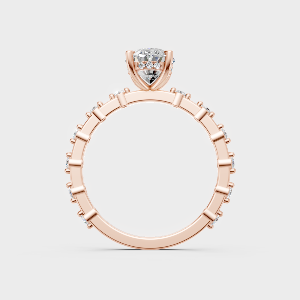 Modern rose gold solitaire ring with a brilliant sustainable oval diamond