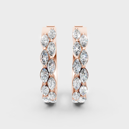 Unique rose gold diamond hoops featuring GLI-certified marquise stones for a soft glow
