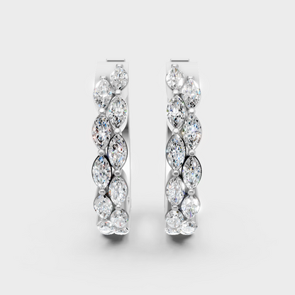 Sleek white gold marquise diamond hoops for high-end ethical luxury