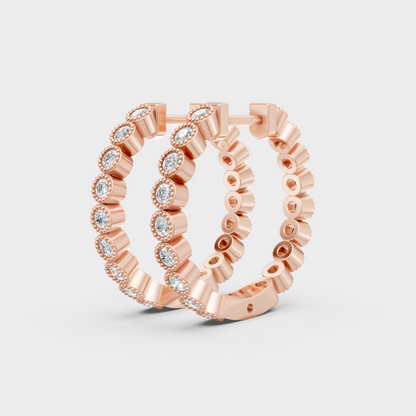 per side round-cut diamond hoops in polished rose gold
