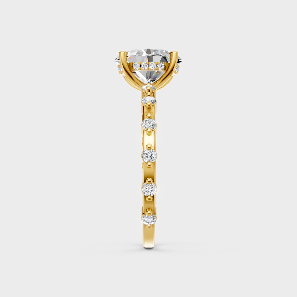 Sustainable yellow gold solitaire with a Gli-certified oval-cut lab-grown diamond