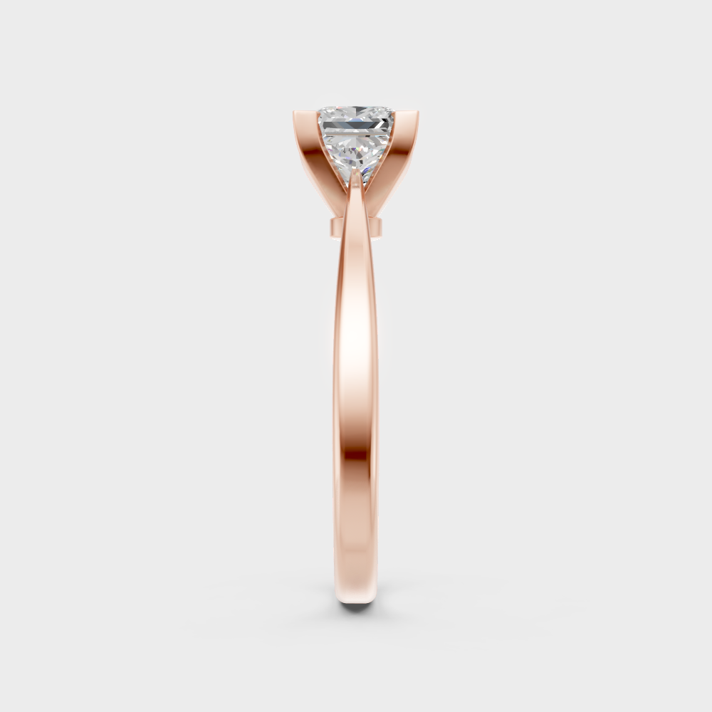 Modern rose gold solitaire ring with a brilliant sustainable princess diamond