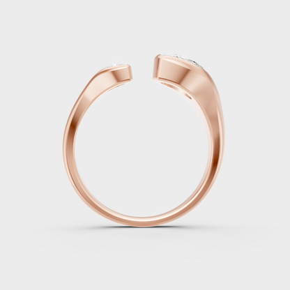 Blush rose gold engagement ring with hallmarked pear-cut lab diamonds