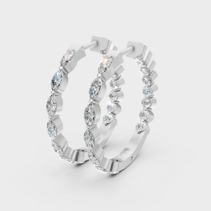 Sleek white gold diamond hoops featuring GLI-certified round and marquise stones