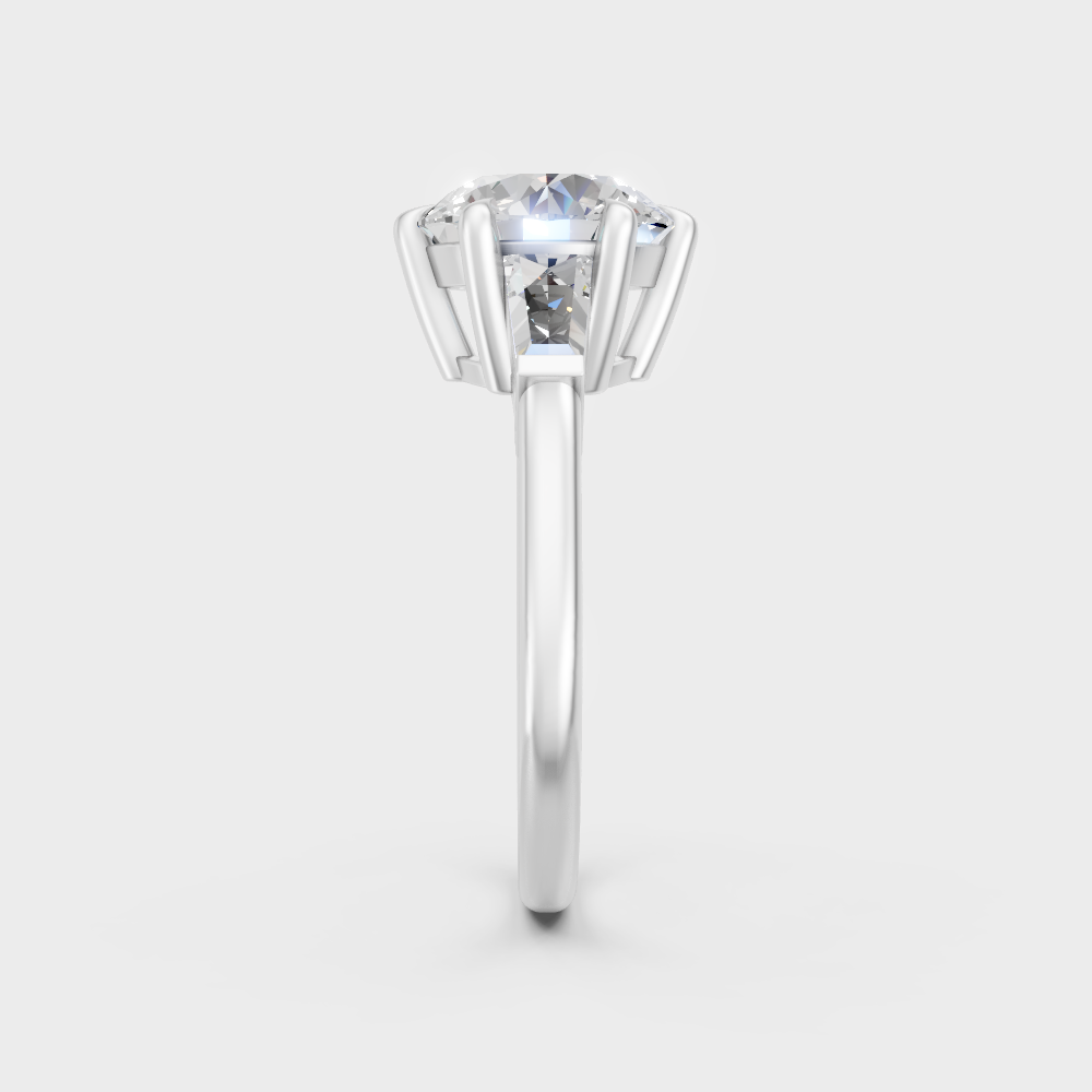  white gold round and baguette trio ring offering an icy, sophisticated sparkle