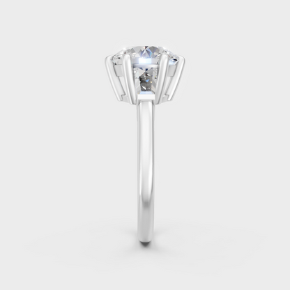  white gold round and baguette trio ring offering an icy, sophisticated sparkle