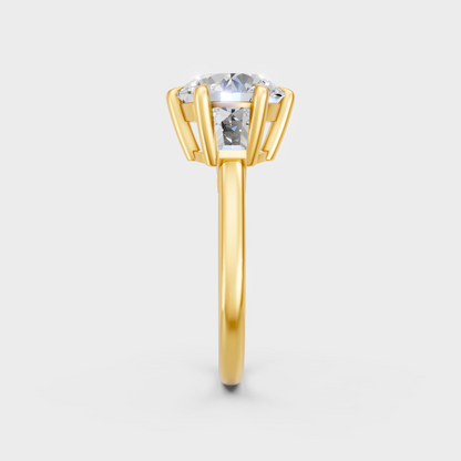 Hallmarked yellow gold trio ring showcasing premium lab-grown round and baguette stones