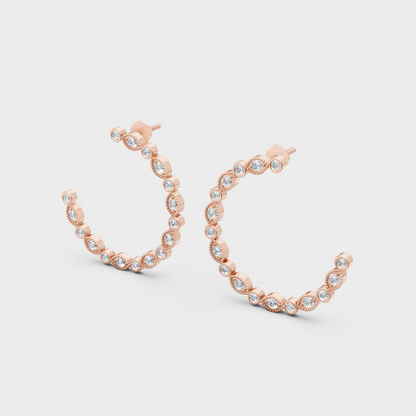 Hallmarked rose gold diamond hoops featuring round-cut ethical diamonds