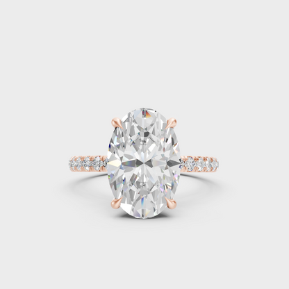 Romantic 4.62 Ct lab-grown diamond hidden halo ring with oval center stone in 18K rose gold.
