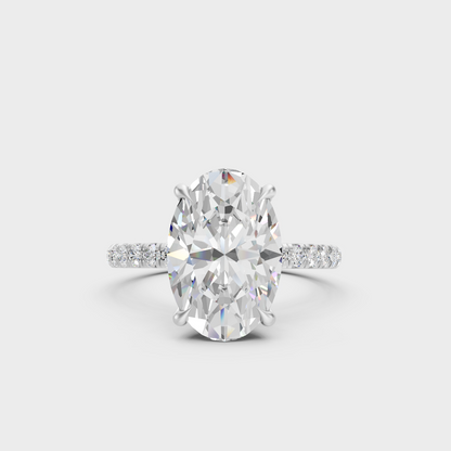 Certified 4.62 Ct oval and round cut lab-grown diamond hidden halo ring in 950 platinum.