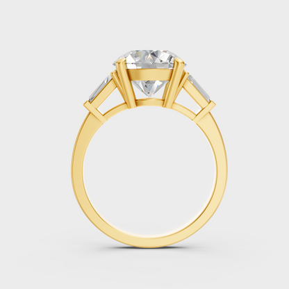 Luxury 3.32 Ct round and baguette three-stone diamond ring set in polished 9K yellow gold.