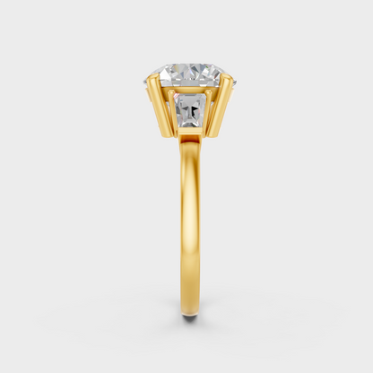 Close-up of 3.32 Ct lab-grown diamond three-stone engagement ring, 18K yellow gold band.