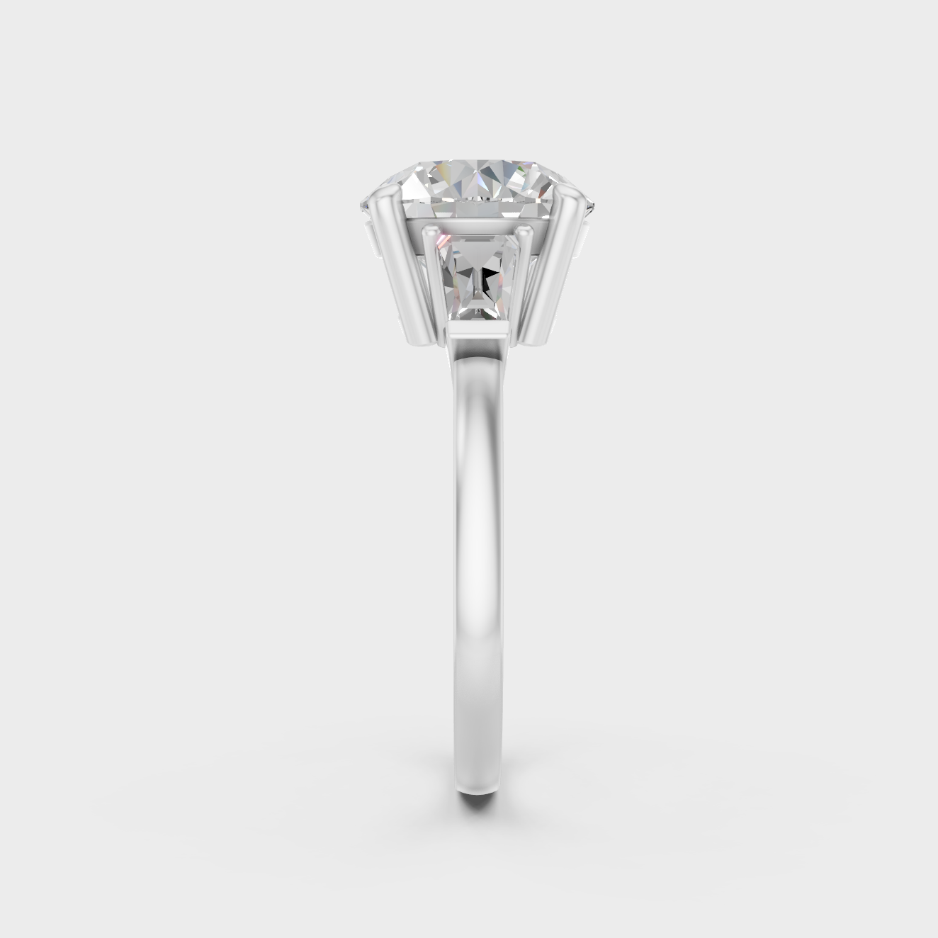 IGI certified 3.32 Ct round and baguette cut lab-grown diamond three-stone ring in 18K white gold.
