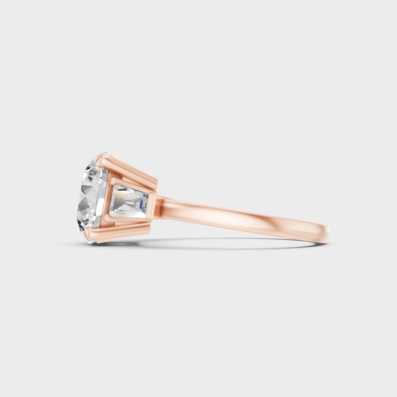 Stunning 3.32 Ct round and baguette lab-grown diamond ring, polished 14K rose gold band.
