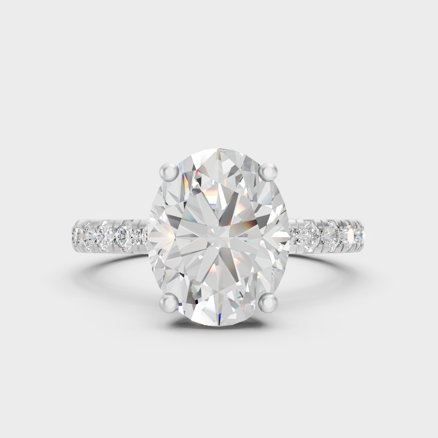 White Gold Oval Proposal Ring Set With Round Accent Diamonds