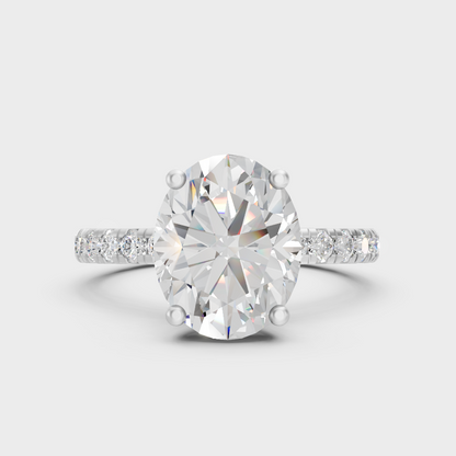 White Gold Oval Proposal Ring Set With Round Accent Diamonds