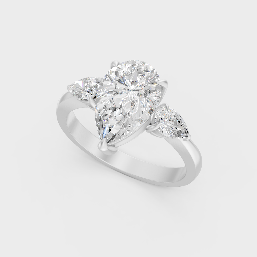 Platinum Pear Cut Diamond Three Stone Ring Timeless Elegance