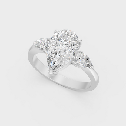 Platinum Pear Cut Diamond Three Stone Ring Timeless Elegance
