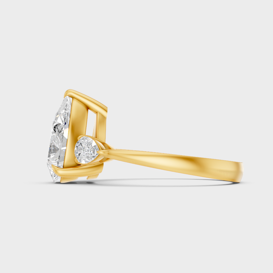 Elegant Pear Proposal Ring In Yellow Gold
