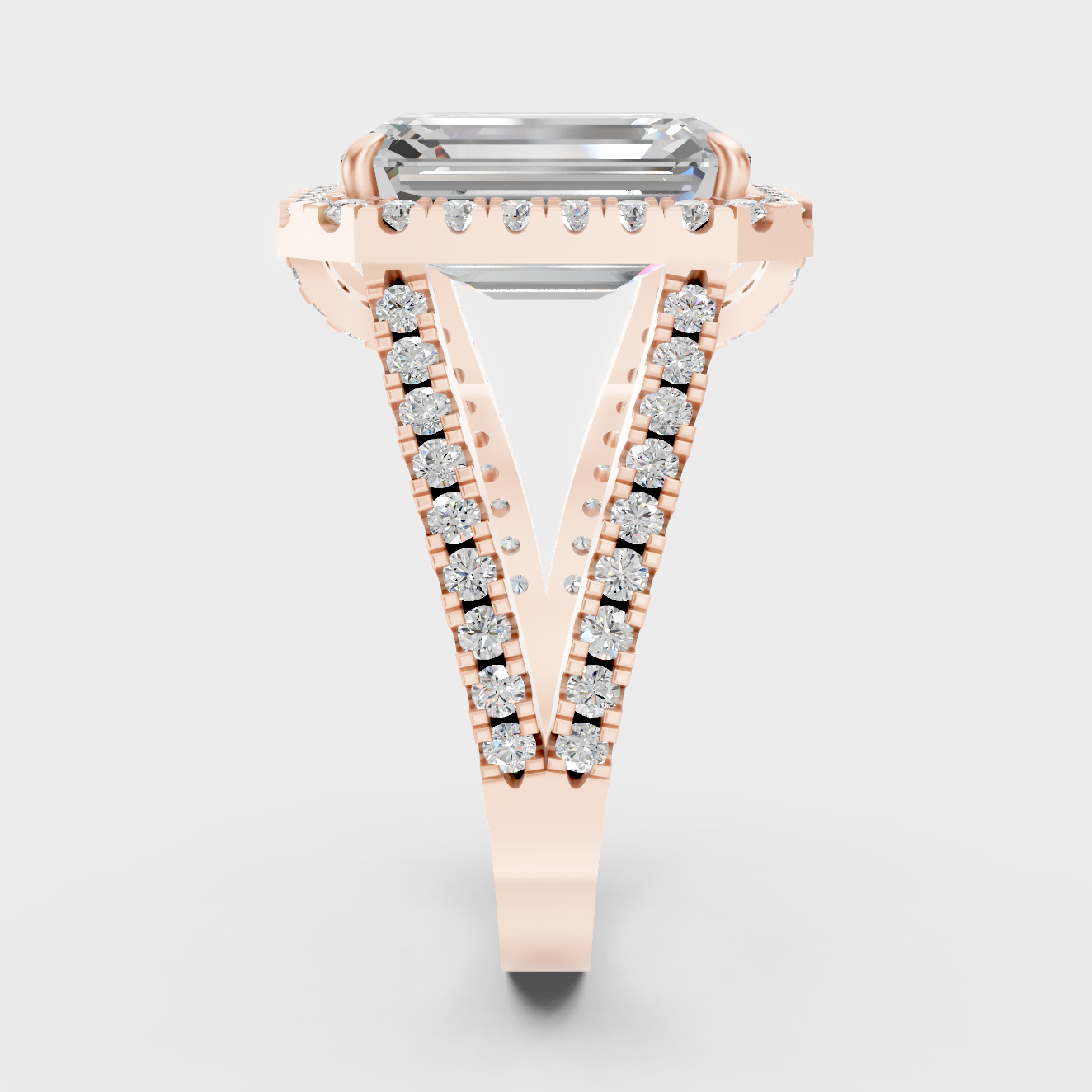 Halo Solitaire Ring In Rose Gold With Emerald Center Diamond