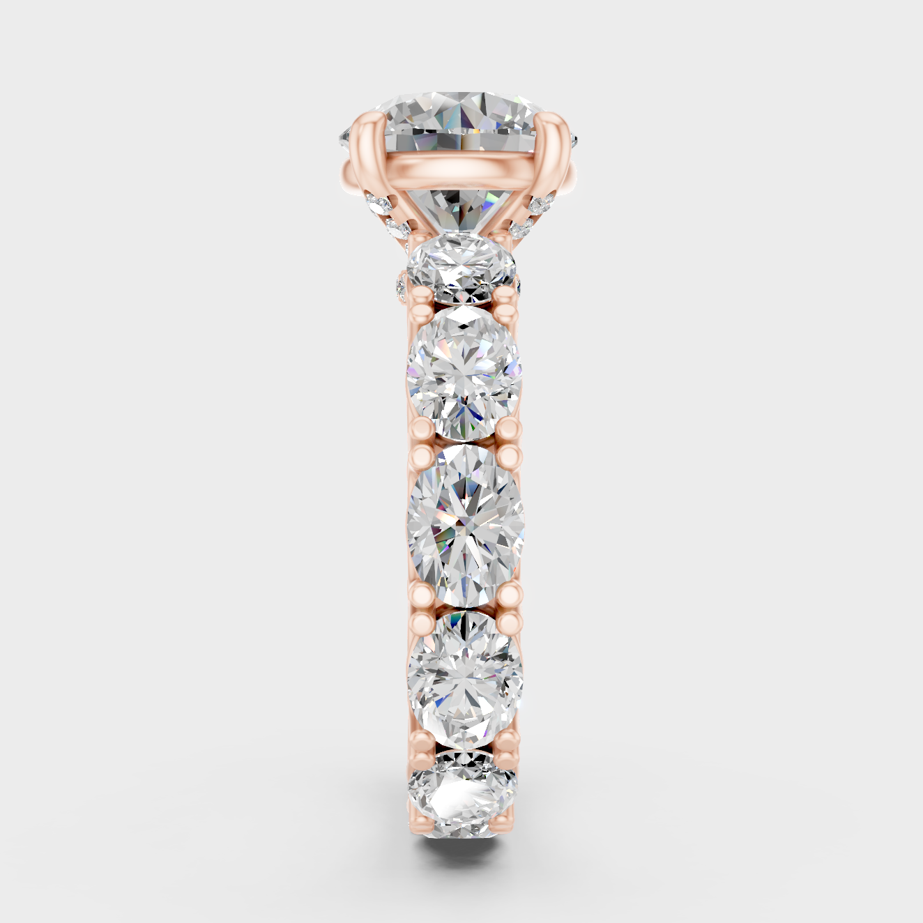 Solitaire Ring In Rose Gold With Round And Oval Diamonds