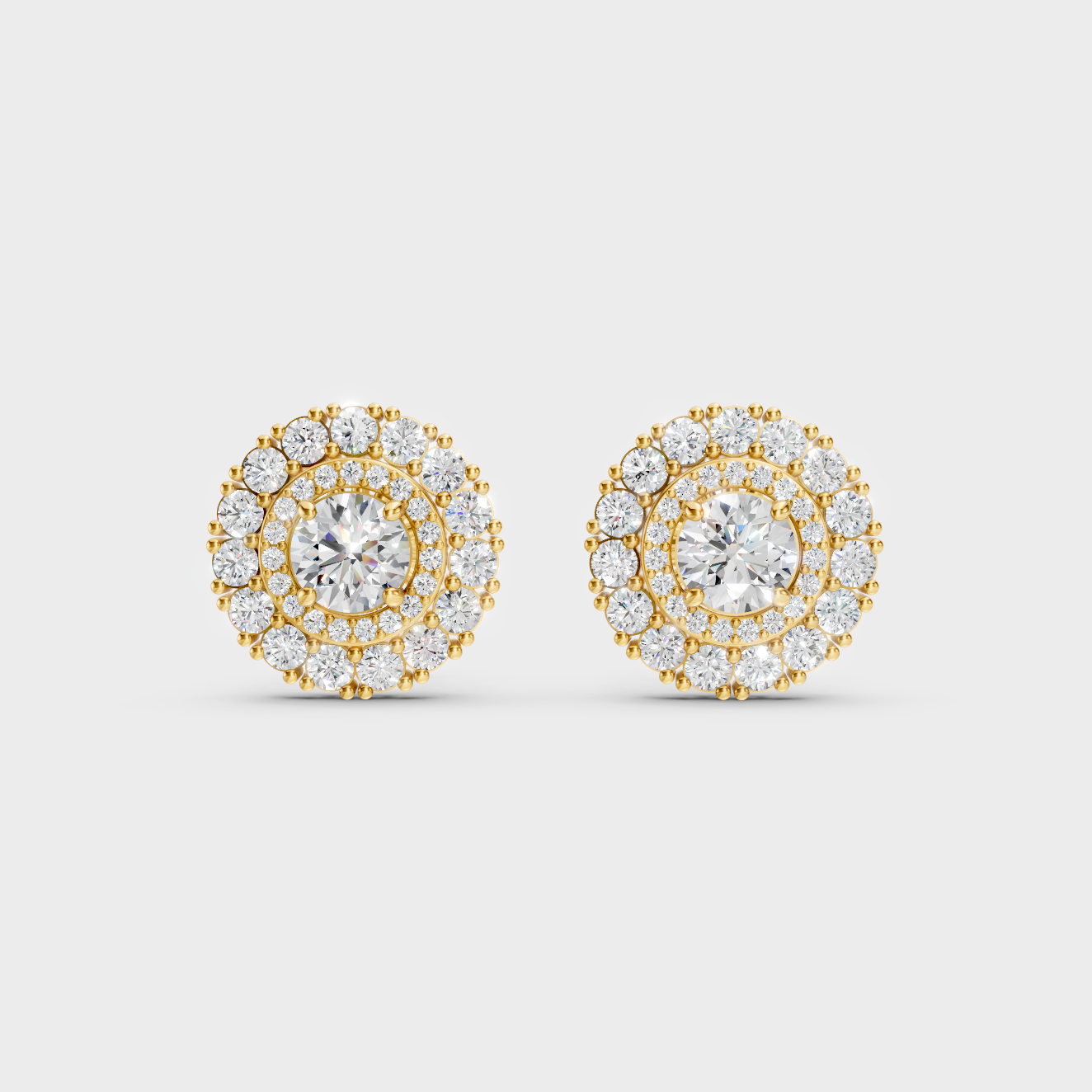 Radiant Yellow Gold Solitaire Earrings With Certified 2.24 Ct Total Weight Diamonds