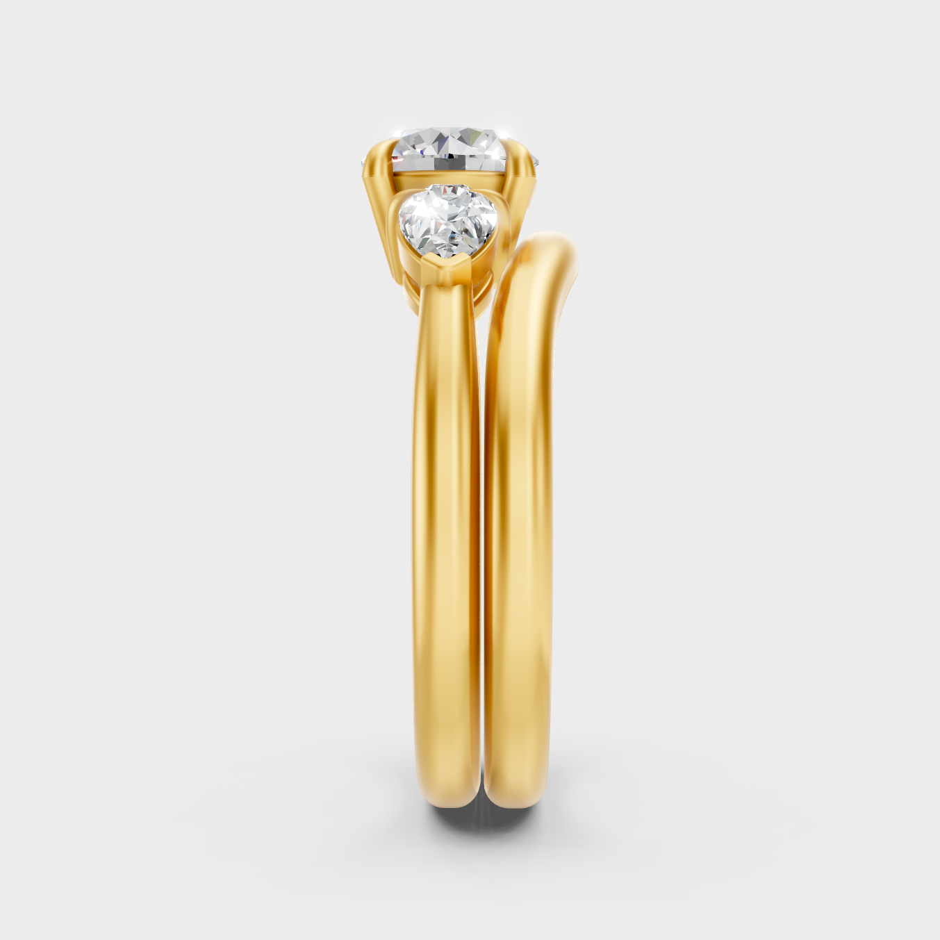 Sustainable Yellow Gold Ring Set Featuring Round Center And Pear Accents