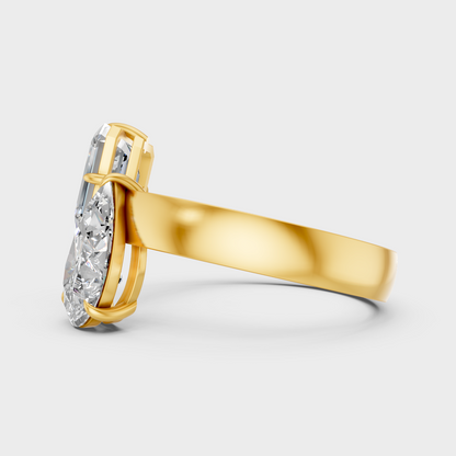 Elegant Emerald Pear Diamond Proposal Ring In Yellow Gold