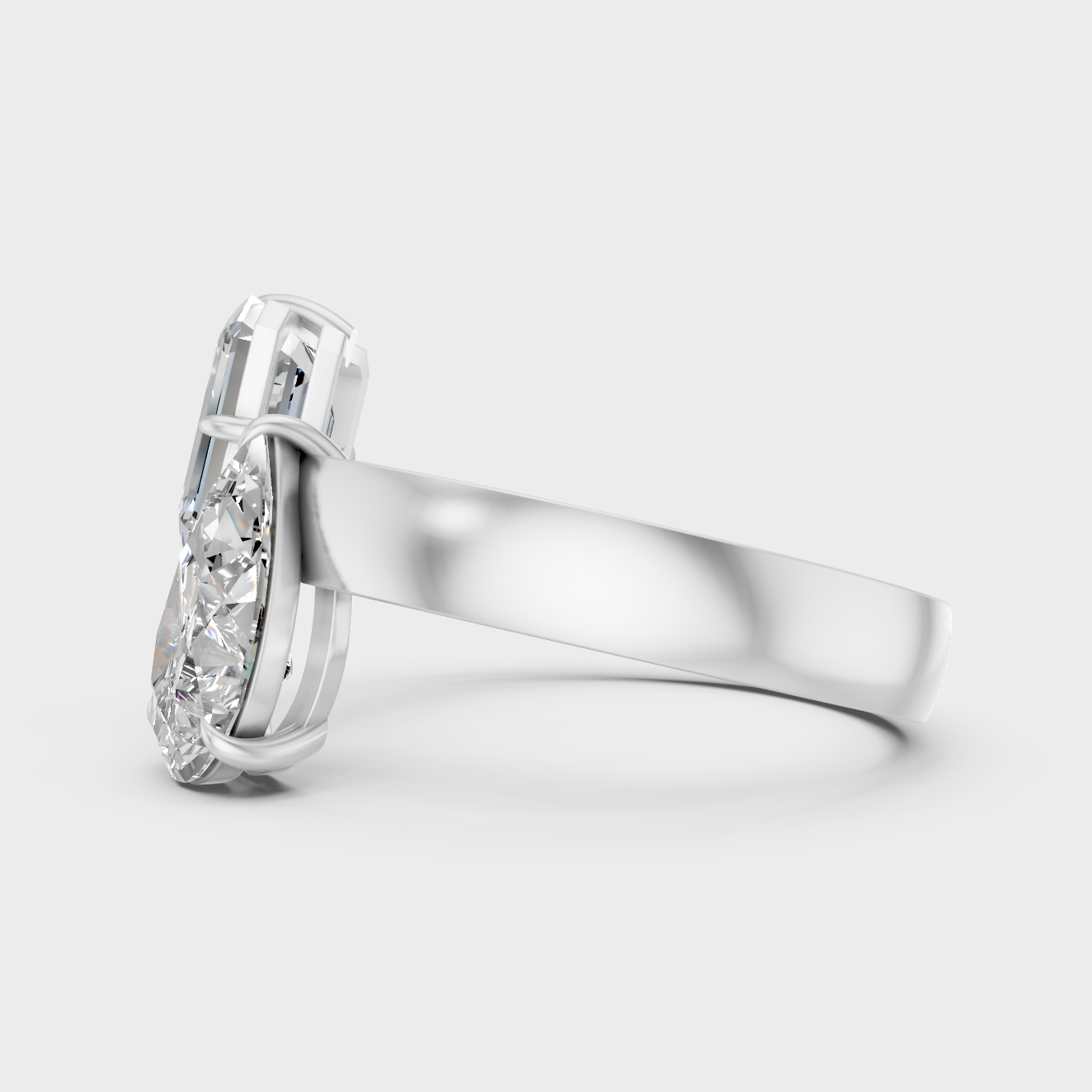 White Gold Emerald Pear Diamond Ring With Brilliant Sparkle