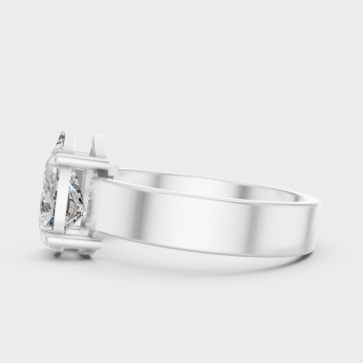 White Gold Emerald Pear Diamond Ring With Brilliant Sparkle