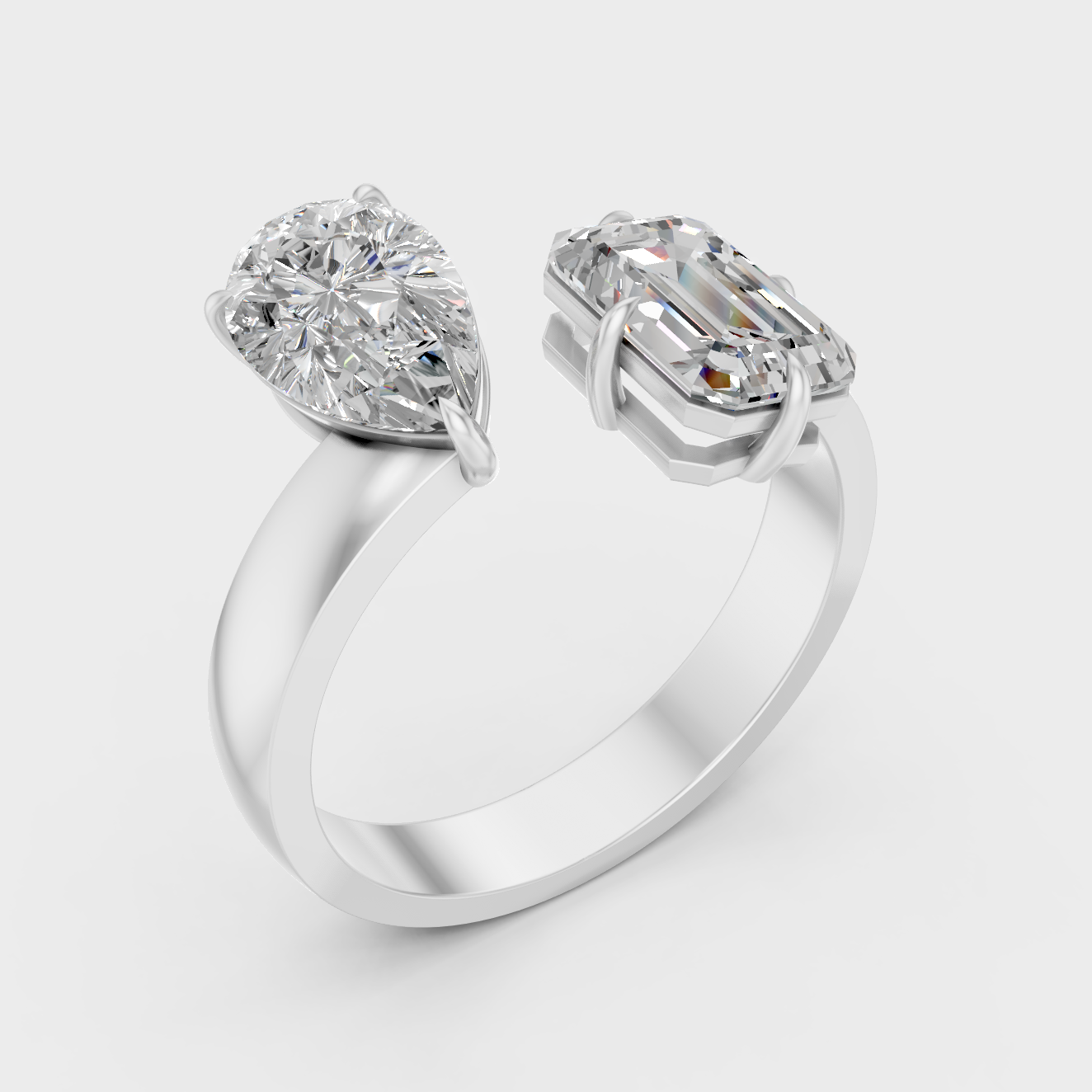 Platinum Toi Et Moi Ring With Emerald And Pear Cut Diamonds