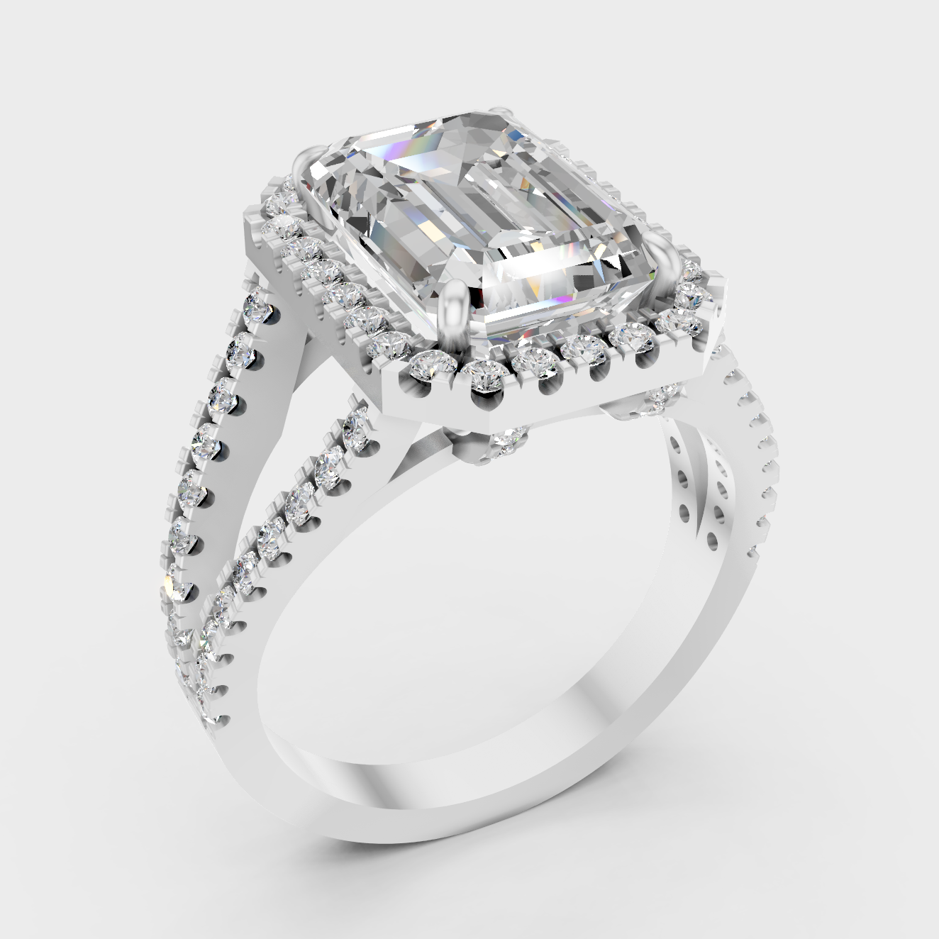 Platinum Emerald Cut Diamond Halo Ring With Brilliant Round Accents