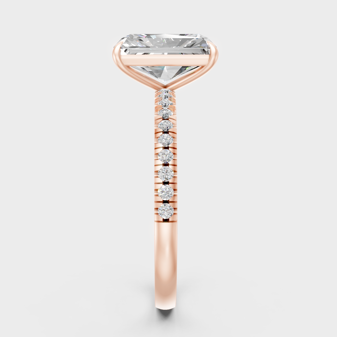 Solitaire Ring In Rose Gold With Radiant And Round Diamonds