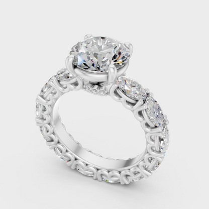 Platinum Engagement Ring With Round And Oval Diamonds