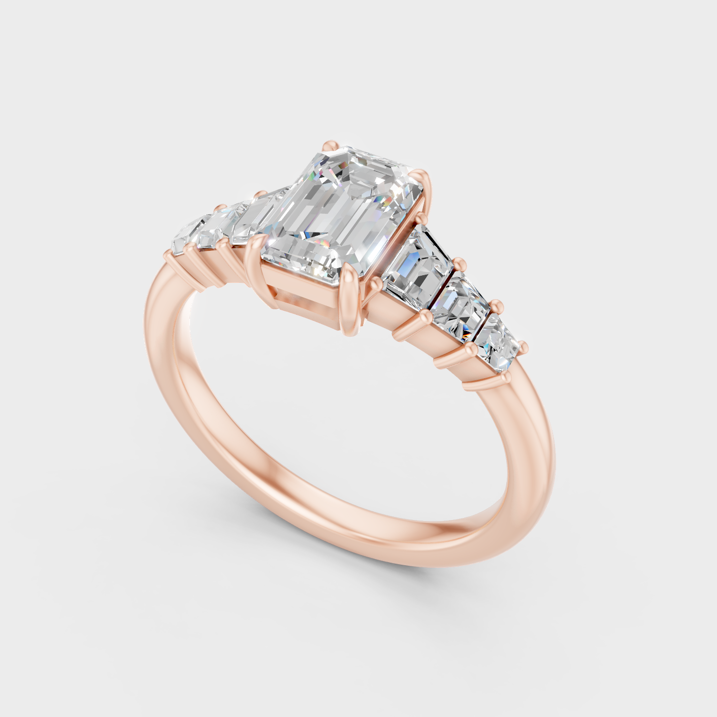 Emerald Cut Diamond Ring With Trapezoid Side Stones In Rose Gold Elegant Style