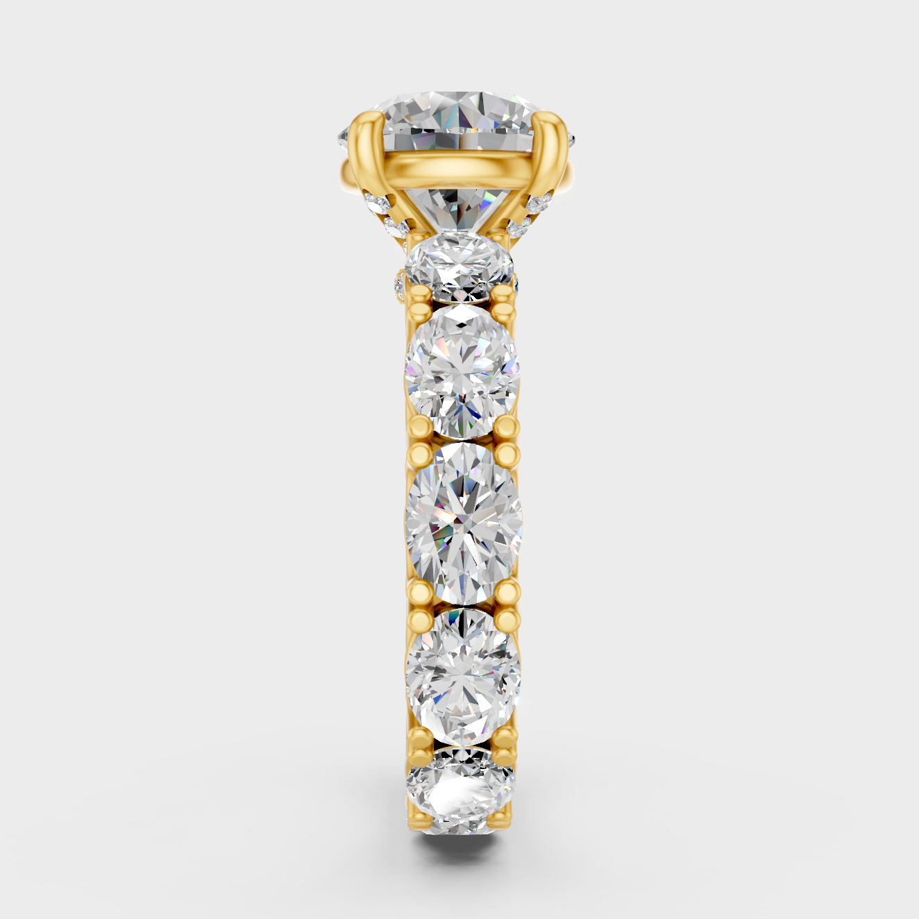 Yellow Gold Anniversary Ring With Oval Accent Stones